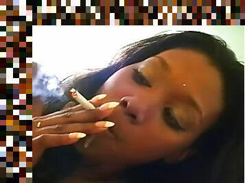 Ebony is sucking a dick and smoking