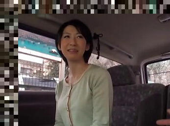 Kinky Japanese model getting attacked with a vibrator on the back seat