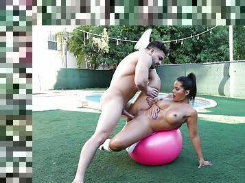 Big-assed Rose Monroe oiled up and fucked outdoors on a yoga ball