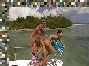 Boat trip leads to threesome on the beach