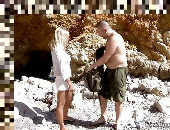 Small tits blonde gets double penetrated on the secluded beach