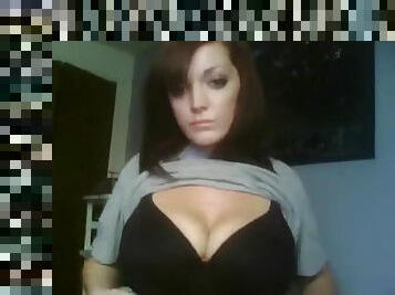 Sexy emo chick plays with her big tits in front of the webcam