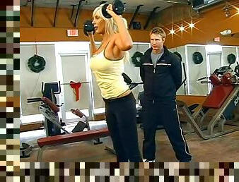 Nasty trainer fucks a bosomy blonde milf in the gym