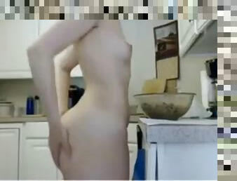 Girl naked cooking