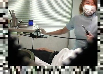 Japanese dentist enjoys stroking a dick of her very lucky patient