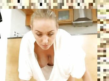 Big boobs bounce as the babe cleans the floor
