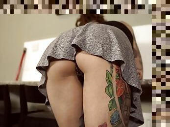 Upskirt girl with a great ass has tons of tattoos