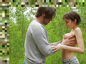 Young babe shares spectacular XXX moments into the woods