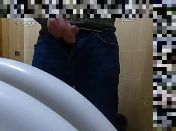 Close up jerk in a toilet