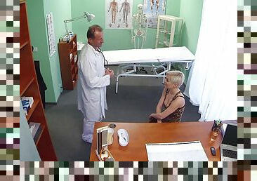 Short haired blonde Sylvia V fucked in the doctor's office