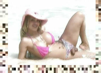 Karla Carrillo on the beach in pink