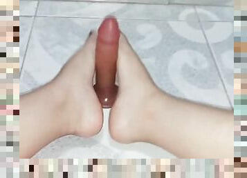 A delicious foot masturbation