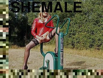 Shemale fucks exercise equipment in the park in the ass