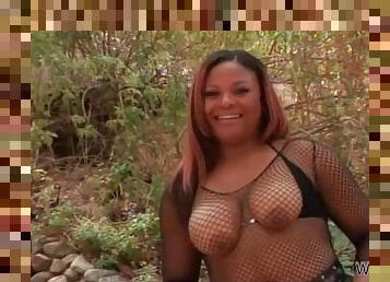Chubby black girl teases big ass outdoors