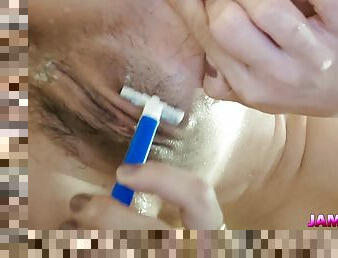 Asian Teen Shaving Her Pussy