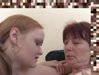 Young redhead is into this mature lesbian