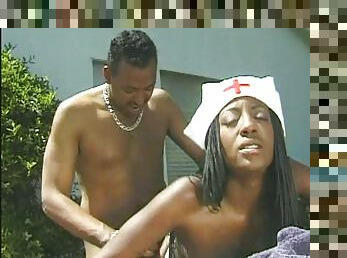 Slutty ebony nurse getting her shaved cunt screwed outdoors