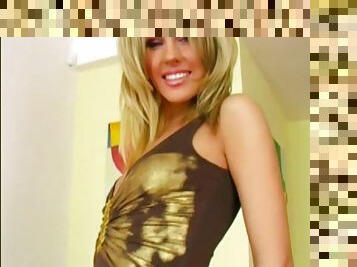 Very beautiful blonde posing before she masturbates
