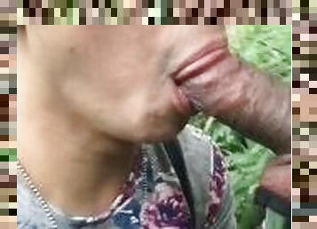 Sucking a huge cock outdoors