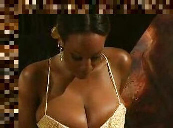 Black girl in ball gown plays with big tits