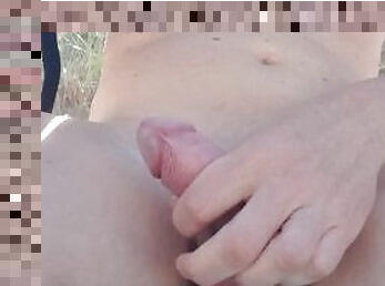 Playing with penis in public on the beach. Handjob/masterbation
