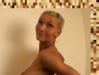 Short-haired Kristyna V is showing her slender body