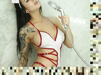 Tattooed nurse with beautiful boobs enjoy dildo in the shower