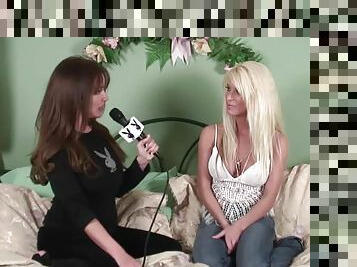 Blonde girl with big boobs gives an interview to brunette chick