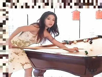 Asian on the pool table strips and poses tits