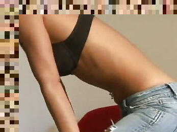 Addison St. James wearing a bra and jeans gives a webcam performance