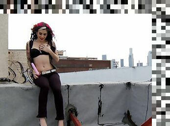 Joanna Angel goes up on the roof and toys her wet slit