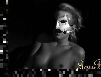 Masked beauty in stockings masturbates erotically