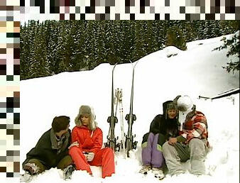 Sexy ladies are fucked out in the snow ina foursome