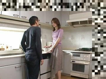 Akari Hoshino sucks a cock and gets fingered in a kitchen