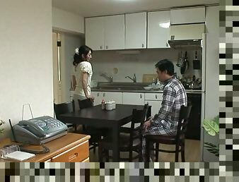 Japanese housewife gives a handjob and a blowjob to her man