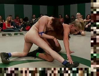 Two blondes and a brunette fight on a ring being naked