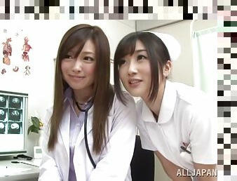 Two Japanese nurses finger and toy another girl