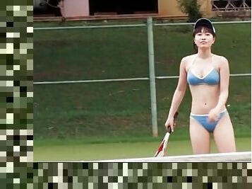 Japanese beauty plays bikini on tennis court