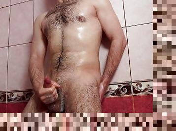 Handsome Noel Dero masturbates his dick in the shower. Muscular handsome man caresses his wet body.