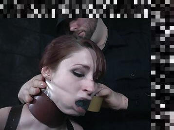 Ball gagged redhead Violet Monroe in a BDSM dungeon