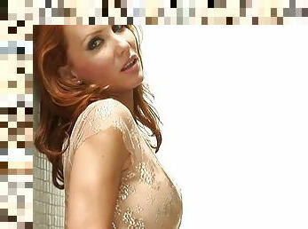 Redhead siren Jennifer Korbin  gives a hot show in the shower