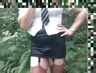 Trans CD schoolgirl smoking in the woods