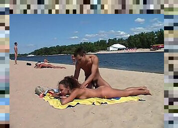 Nudist teen not shy about posing nude at the beach