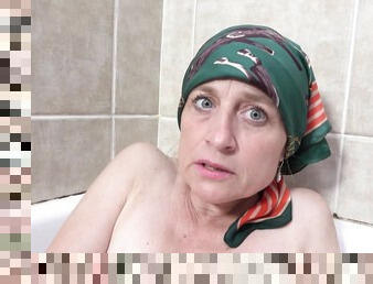 72 years old granny takes a soapy shower prolapse her pussy extreme peeing