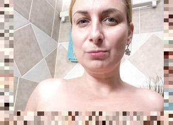 horny ninth month pregnant milf with big natural boobs masturbating in the bathtub and squirting