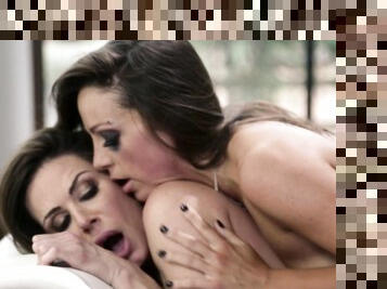Kendra Lust and Abigail Mac make love in the living room