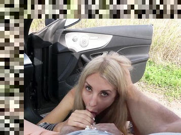 Blonde whore filmed trying hard cock by the side of the road